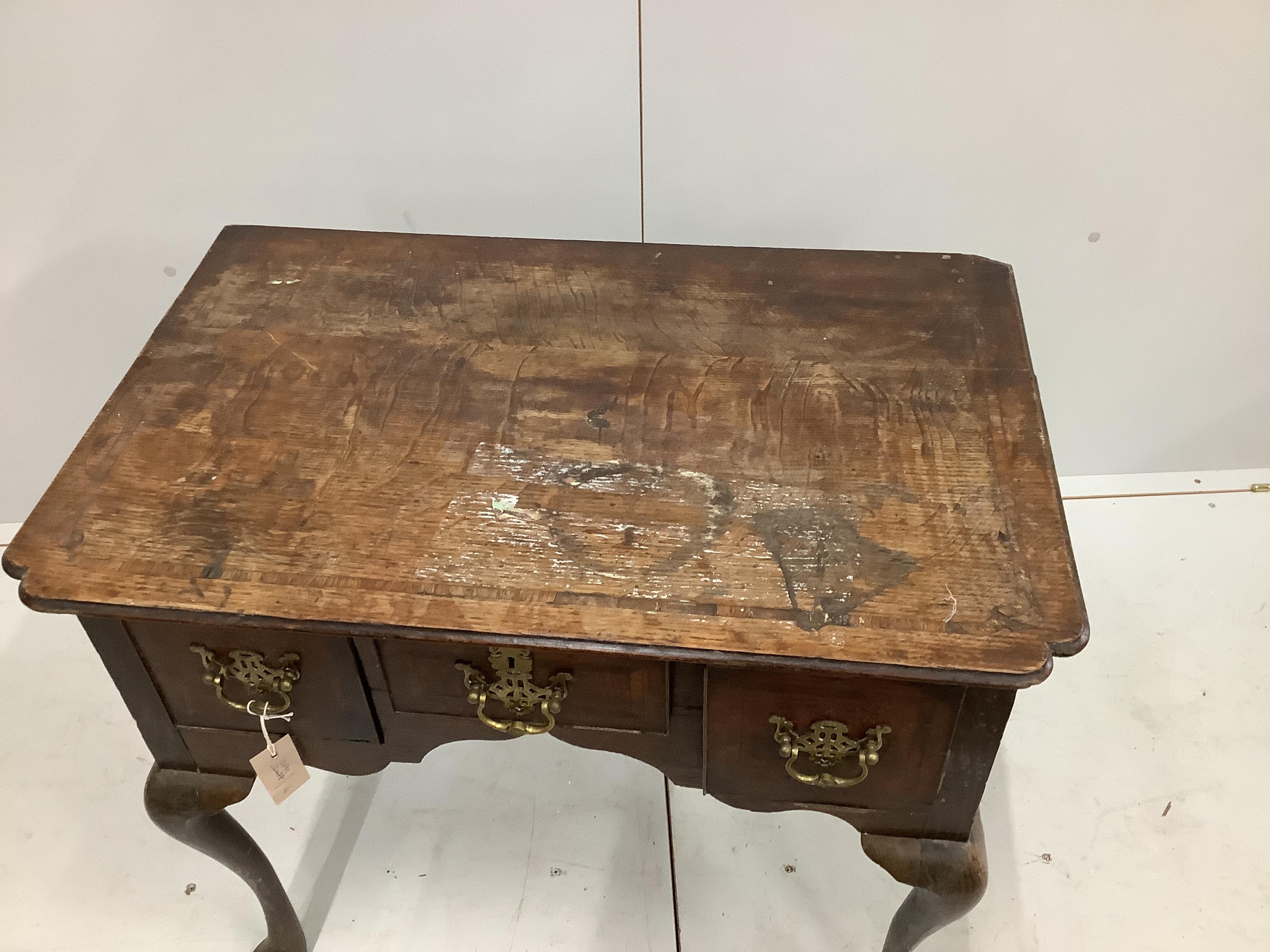 A George III mahogany banded oak lowboy, width 75cm, depth 48cm, height 72cm